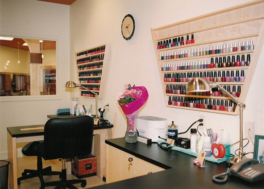 The nail stations include built-in ventilation right at the counter top